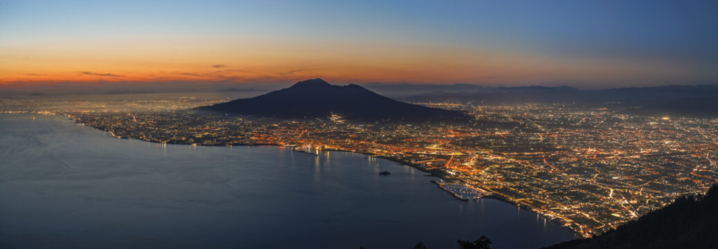 View of Naples bay and Vesuvio volcano from the mountains during Sunset from the Amalfi Coast.