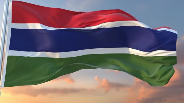 Gambia Flag Waving on Flagpole at Sunset 4K Video