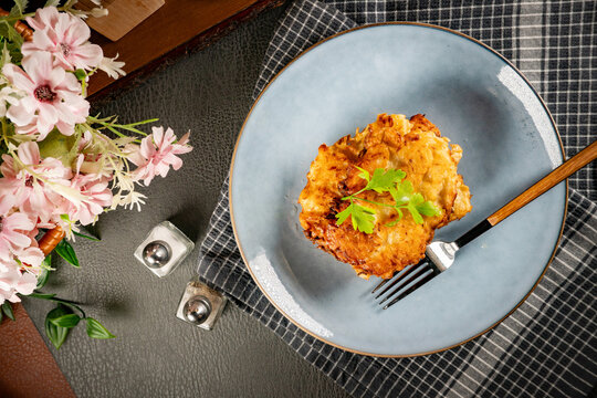 Sauerkraut pancakes (fuczki) with mushroom sauce - a traditional Lemko dish.