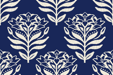 Ikat floral paisley embroidery seamless pattern on background. Ikat ethnic flower oriental pattern traditional. Aztec style abstract vector illustration. design for ikat floral fashion fabric,clothing © supachai