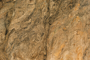 Naklejka premium Natural pattern in eroded mineral rock stone. Detail shot.