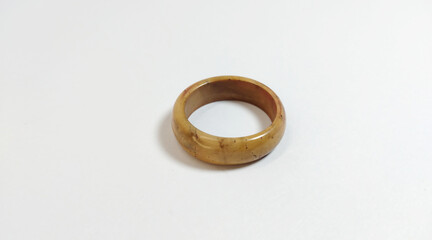 wooden ring, creative and unique craft, typical brown wood color, white background,