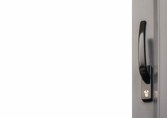 The handle of the plastic sliding door is dark in color