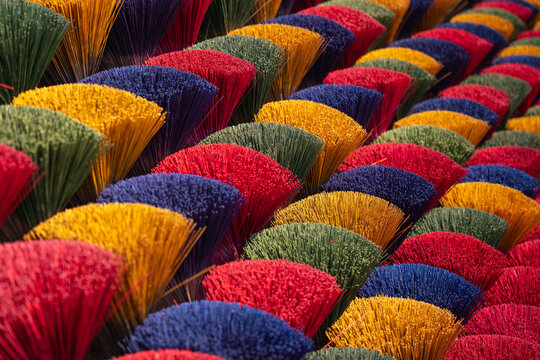 Aerial view of vibrant bundles of incense sticks create a textured mosaic of color, a craft tradition, Ung Hoa, Ha Noi, Vietnam.