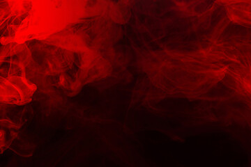 Fototapeta premium Red steam on a black background.