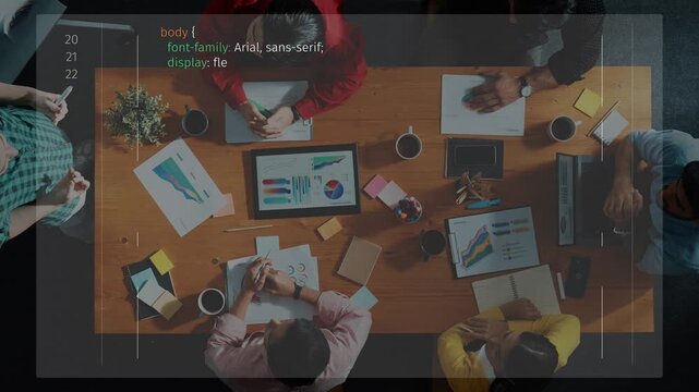 A vibrant workspace featuring a team collaboration setup, laptops, charts, and coffee cups, demonstrating modern task management and creative teamwork. Raster