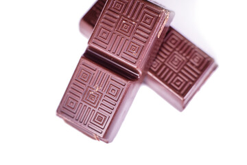 Delicious dark chocolate on a light background