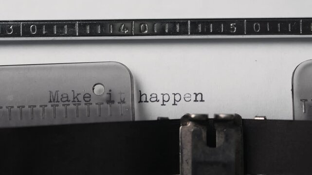 Inscription on a retro vintage typewriter make it happen