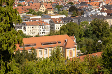 Obraz premium View from Michelsberg Monastery (Kloster St. Michael) in Bamberg, Bavaria, Germany, overlooking historic old town, vineyards and gardens, scenic UNESCO city panorama and European travel landmark.