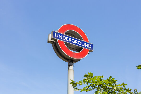 London Underground roundel sign against clear blue sky. London, UK, 2 June 2024