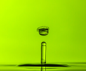 Color drops splash with umbrella or balls in fresh water