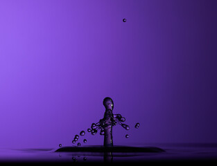 Color drops splash with umbrella or balls in fresh water