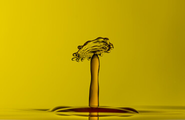 Color drops splash with umbrella or balls in fresh water