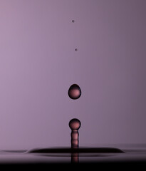 Color drops splash with umbrella or balls in fresh water