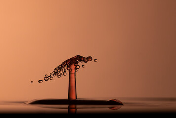 Color drops splash with umbrella or balls in fresh water