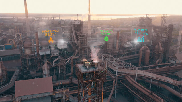Smart industrial complex with digital data overlays monitoring  heat levels, air quality, and real-time flow rate. An industrial complex with digital data overlays displaying a heat level , nominal ai