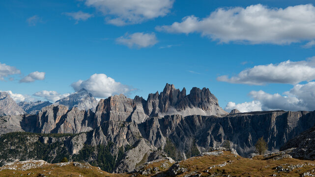 Cinque Torri and Dolomites Wide Panorama with Blue Sky and Clouds, Alpine Meadow Landscape, Italy
