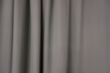 Obraz premium A long, flowing piece of fabric with a grey color