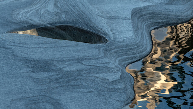 Abstract Blue Rock Surface with Water Reflections, Verzasca Valley in Switzerland
