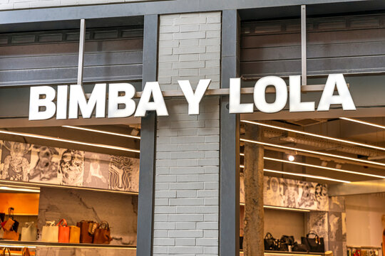 Seville, Spain; October 15, 2025: Bimba y Lola women fashion store with logo sign on storefront.