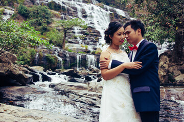 Portrait Wedding on huge Mae Ya waterfall Wedding in Asia