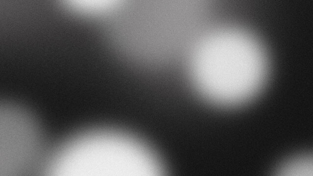 Soft gradient blurred gray background with blurred light circles textured with noise grains