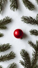 Festive Christmas Bauble and Fir Branches on Textured White Background