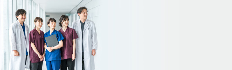 Medical workers in scrubs, medical staff, female nurses and male doctors in white coats