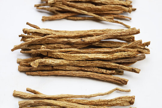 Dried brown Codonopsis root sticks used in Chinese herbal medicine.