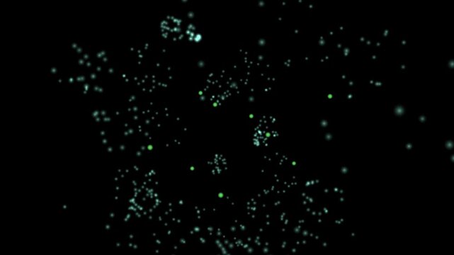 Green and white dots drift across a black cosmic background