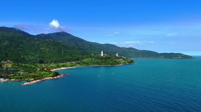 Spiritual landmarks of Da Nang, Vietnam, featuring the Lady Buddha statue and Non Nuoc Pagoda surrounded by mountains and coastal scenery.