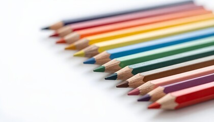 Fototapeta premium A vibrant array of colored pencils on a white background, symbolizing artistic expression for World Art Day