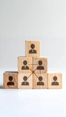 Wooden Blocks Illustrating Business Hierarchy and Teamwork.