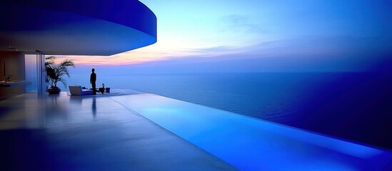 Cliffside infinity pool at sunset