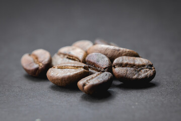 Close up of coffee beans are the background.