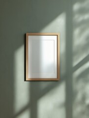 Framed Artwork on Green Wall with Shadow