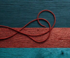 Red String on Painted Wood
