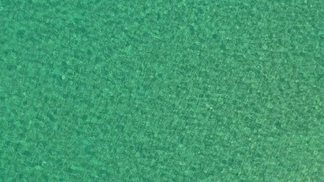 The sea with turquoise water surface background.