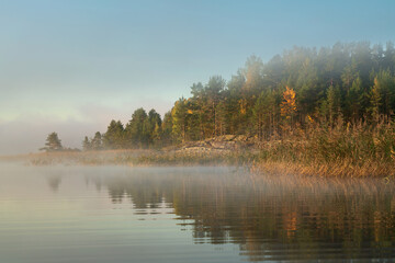 Ladoga Skerries National Park near the village of Lumivaara on an early foggy autumn morning, Republic of Karelia, Russia