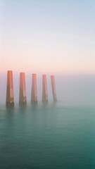 foggy pastels including mist grey, cloud peach, and pale lavender arranged as vertical