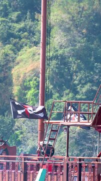 Pirate Ship Jolly Roger Flag Waving in Phi Phi Islands