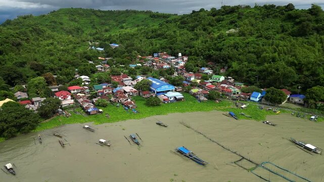 Cinematic aerial footage of Ithan, Rizal featuring a long scenic road surrounded by hills, greenery, and rural countryside landscapes.