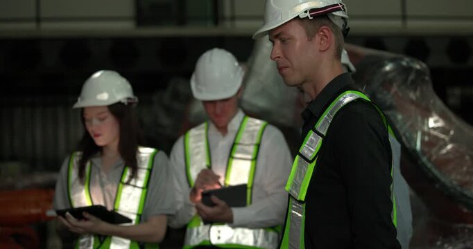 Engineering supervisor mentors trainee in robotics environment, emphasizing the importance of leadership, communication, and continuous education in managing complex machinery and technical processes
