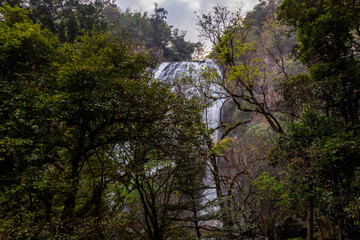 The background of the sea by the evening sea, with natural beauty (sea water, rocks, sky) and fishermen are fishing by the river bank, is a pleasure during travel.