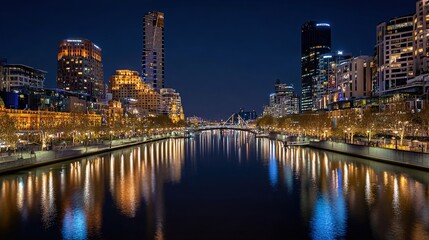 Naklejka premium longexposure. A nighttime cityscape glows with lights reflecting on the river, captured in a long exposure effect. real-estate listings.