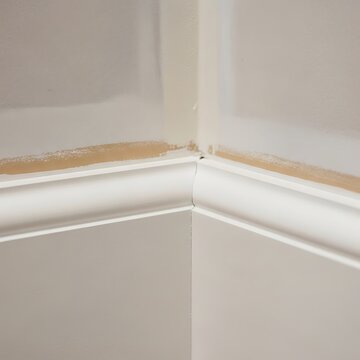 Corner Molding Detail - Crisp Lines and Neutral Tones.