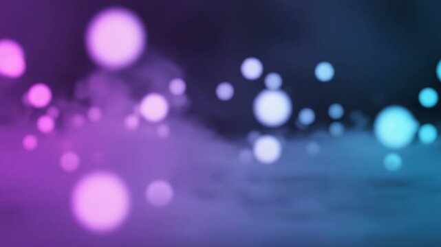 A mesmerizing video background featuring a vibrant display of colorful glowing dots in shades of purple and blue creating a dynamic visual effect in a digital video.