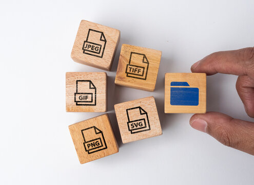 Tag wood with icons of 5 types of image files namely JPEG, PNG, GIF, TIFF and SVG. The concept of saving files in the form of an image