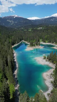 Caumasee Lake Cauma Switzerland Swiss alpine nature landscape aerial, vertical video