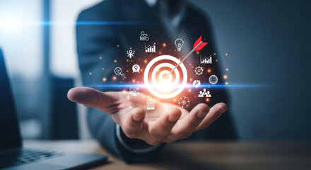 Fototapeta premium Businessman Holding Target with Arrow Surrounded by Business Icons Concept of Goal Achievement Strategy Marketing Success and Digital Transformation